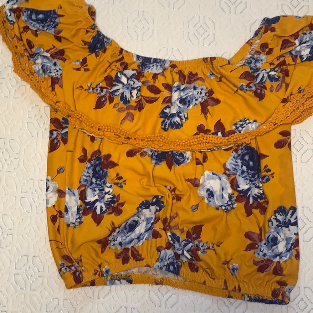 This cute floral yellow/orange top!